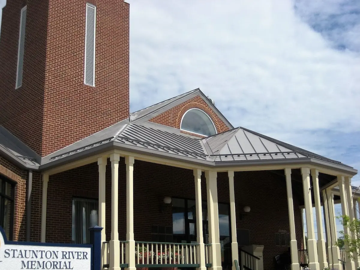 Skilled roofing craftsmen working on a residential roof in Barkers Crossroads